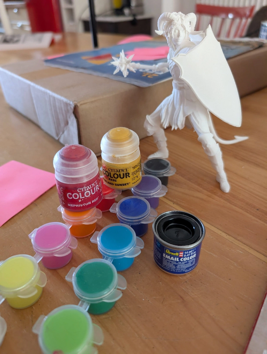 My painting desk setup with brushes and Citadel colors.