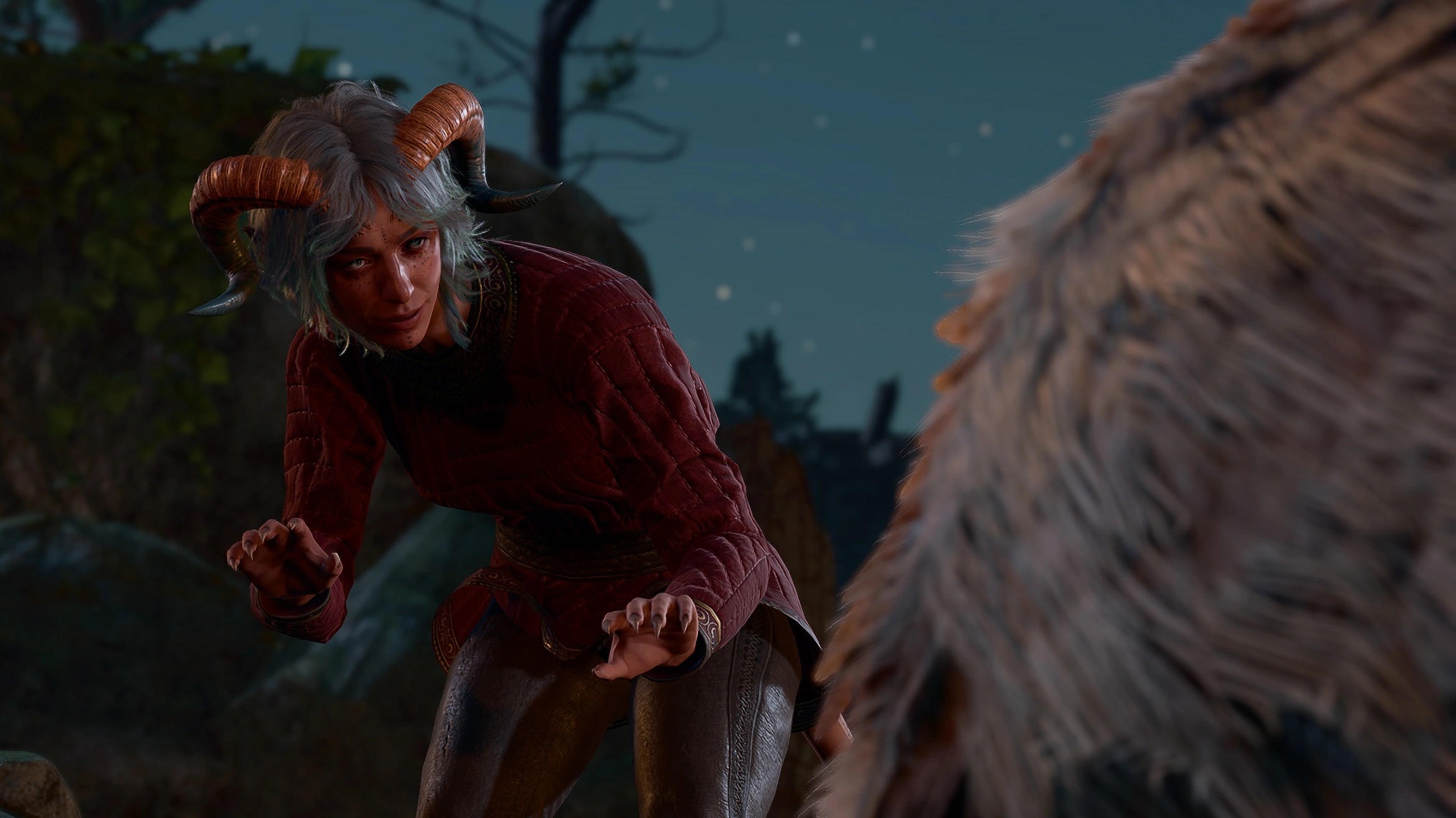 Ramie being gentle with the Owlbear Pup.