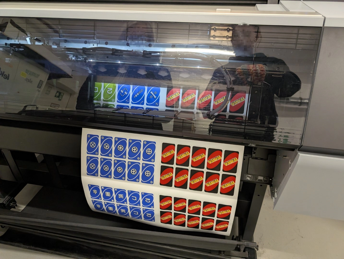 The large format printer at the university printing the sheets.